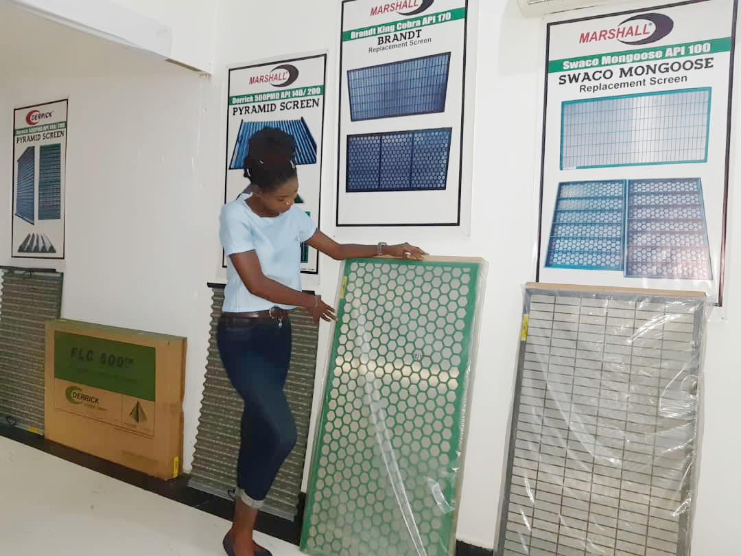 Marshall team member presenting a replacement shaker screen